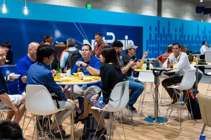 Guests enjoying meal in exhibit hall