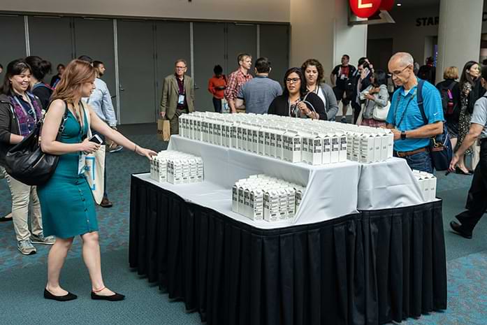 Attendees getting refreshments