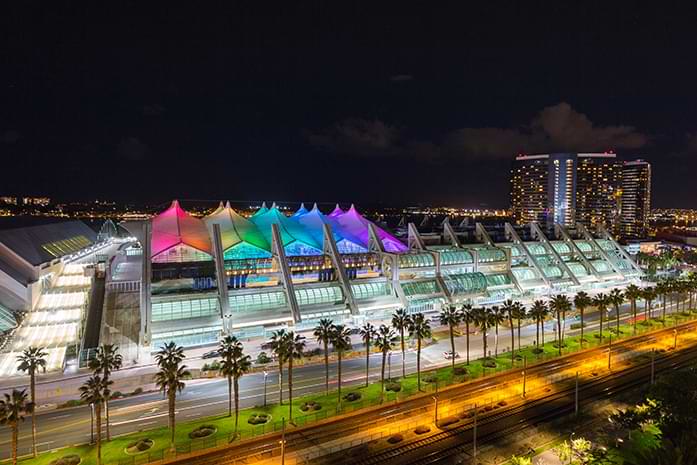 San Diego Convention Center at night with Sails Pavilion colored