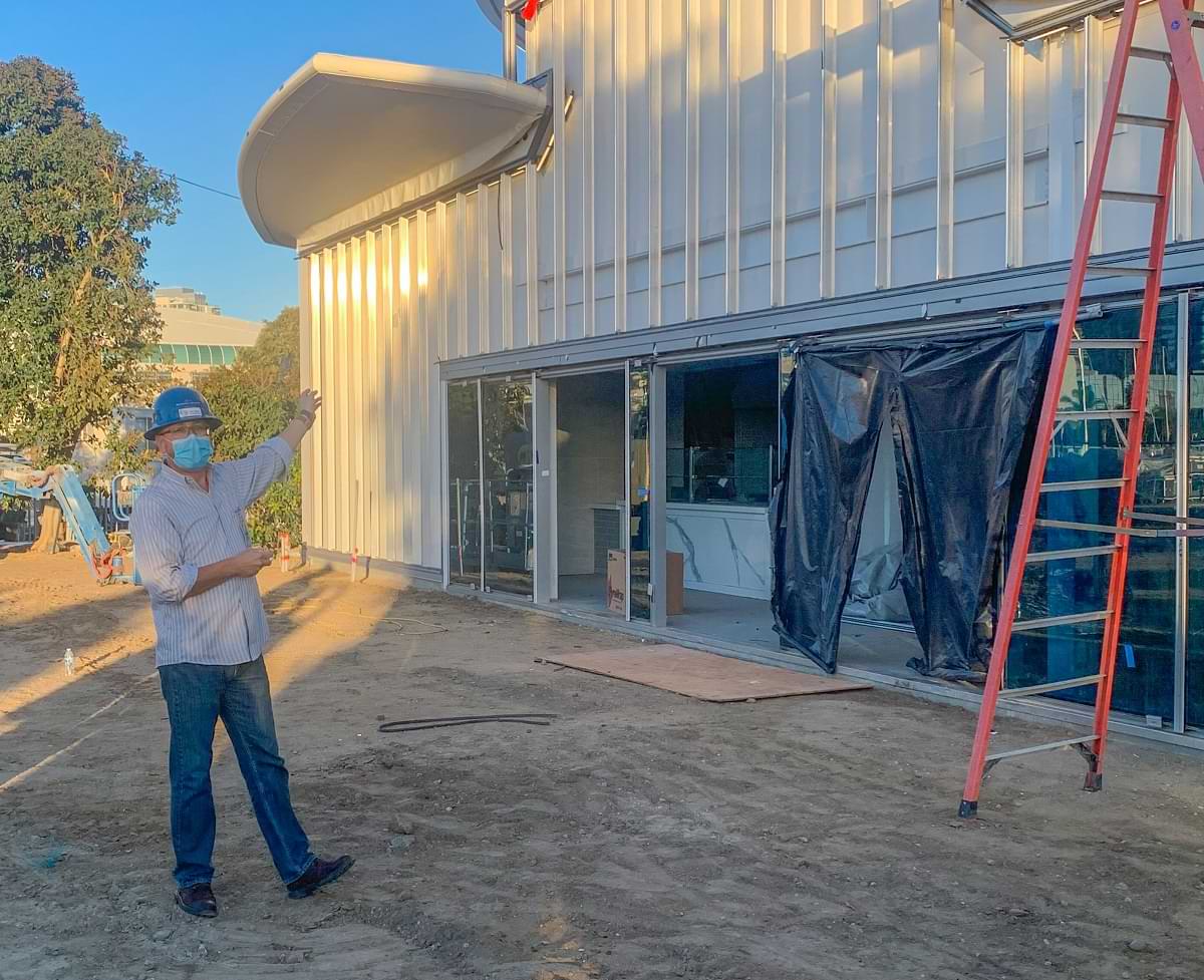 Bobby Ramirez points out the partially constructed cafe 