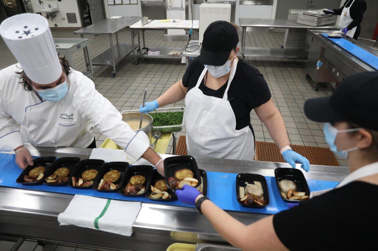 Centerplate staff prepare dinner for shelter residents